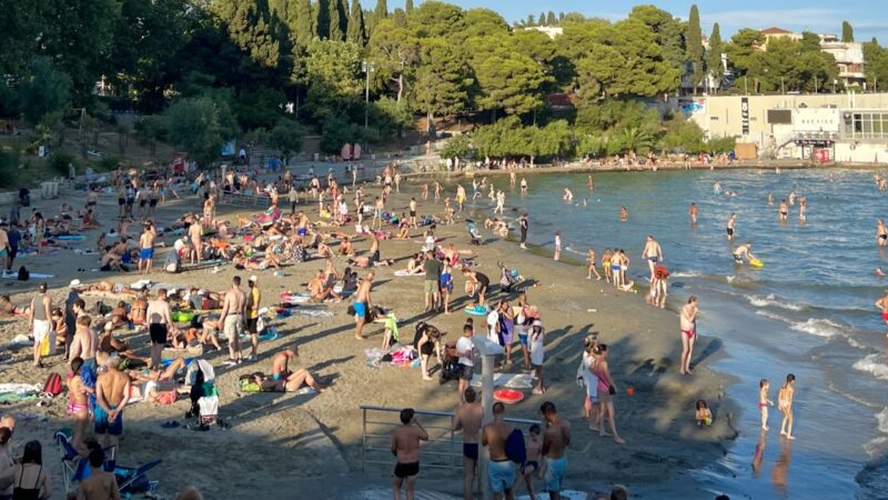 Fotografie turistů na pláži